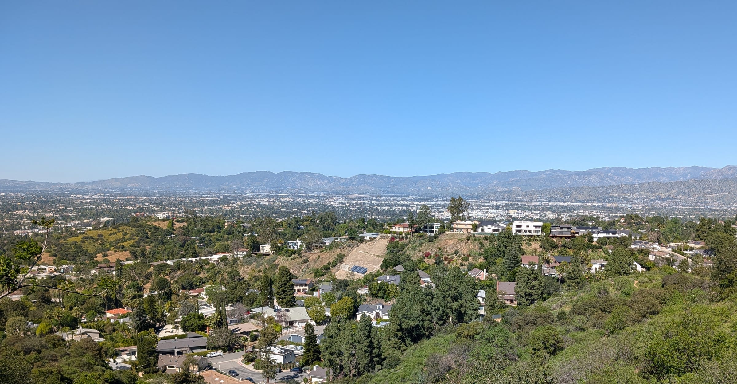 Panoramic view over the Laurelwood hillside homes and the San Fernando Valley.
